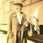Frances Kellor, pictured in front of Hughes' Campaign Special