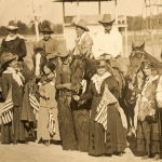 Hughes suffragettes women with cowboys in Miles City, MT Hughes suffragettes women with cowboys in Miles City, MT