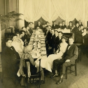 Elisabeth Freeman is at the head of the table on the left Elisabeth Freeman is at the head of the table on the left